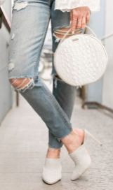 Sydne-Style-shows-how-to-wear-mules-for-spring-in-off-white-slides-from-revolve
